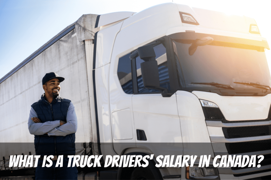 Un hombre sonriente se para frente a su vehículo para ganarse el salario de su camionero en Canadá