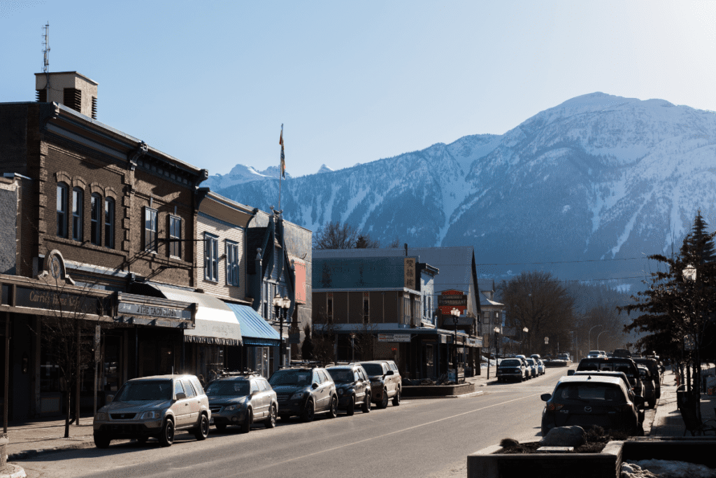 Downtown Revelstoke With Snow Capped Mountains In Background One Of Best Small Towns In Bc Canada