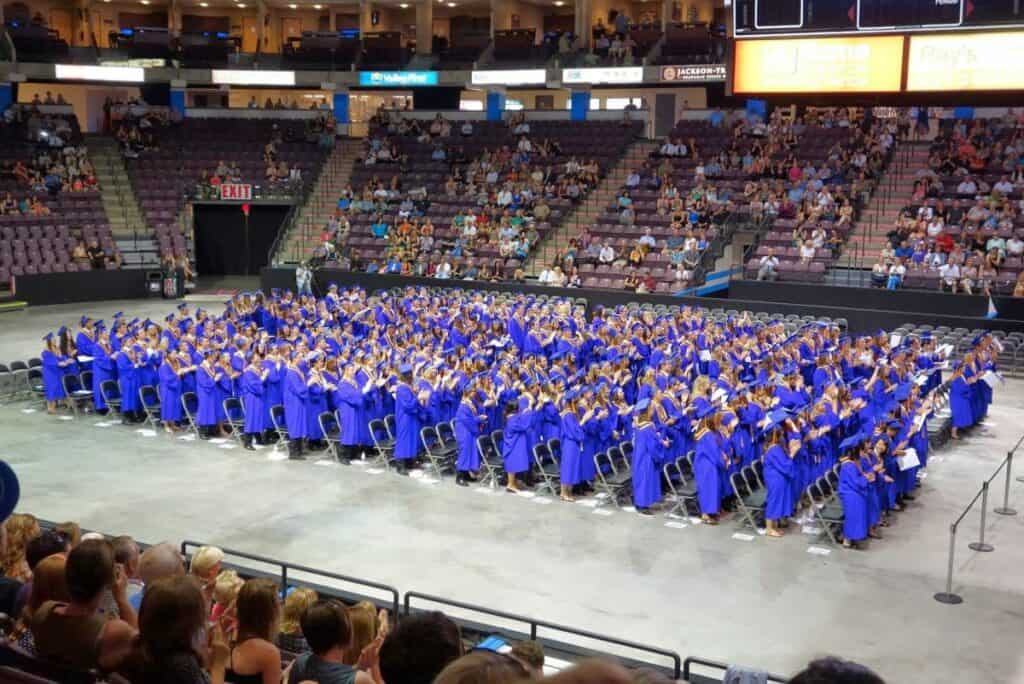 Graduating High School Students In Purple Gowns At Their Graduation Ceremony Education Is One Of The Best Reasons To Move To Manitoba