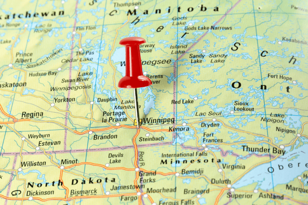 A Map Of Winnipeg And Southern Manitoba With A Red Pin Showing Winnipeg'S Central Location One Of The Best Reasons To Move To Manitoba 