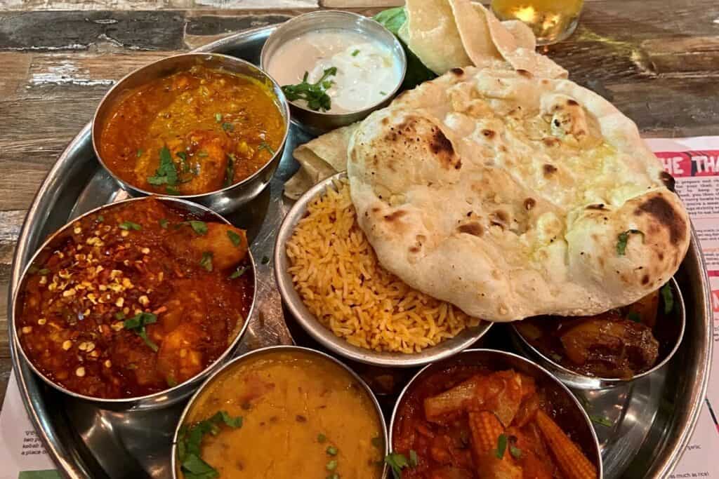 A Platter Of East Indian Food With Curry Rice And Naan Bread One Of The Best Reasons To Move To Bc